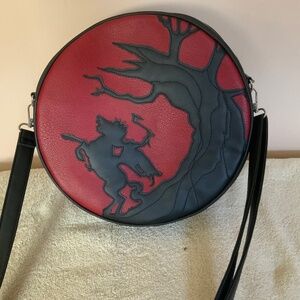 La femme en noir sleepy hollow purse